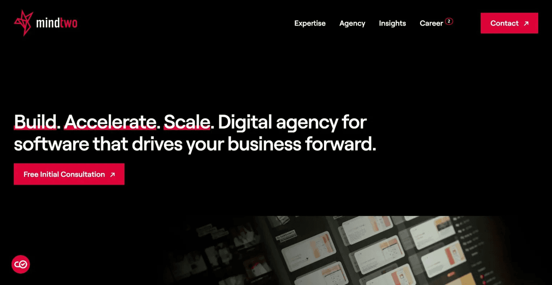 Mindtwo agency homepage with bold slogan about building, accelerating, scaling digital software and a consultation button