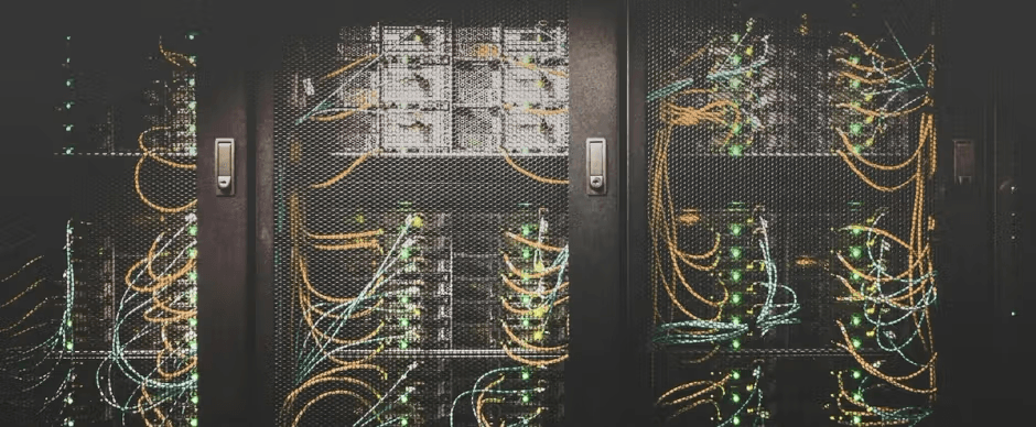 Server rack with colorful network cables and blinking equipment