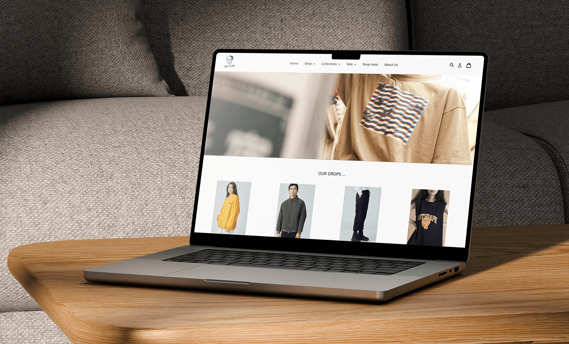 Laptop on couch showing e-commerce product listing page