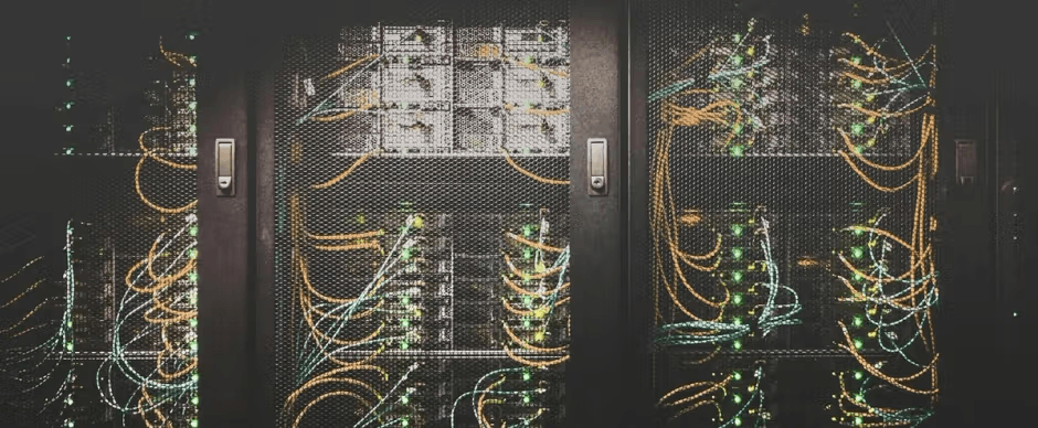 Server rack with colorful network cables and blinking equipment