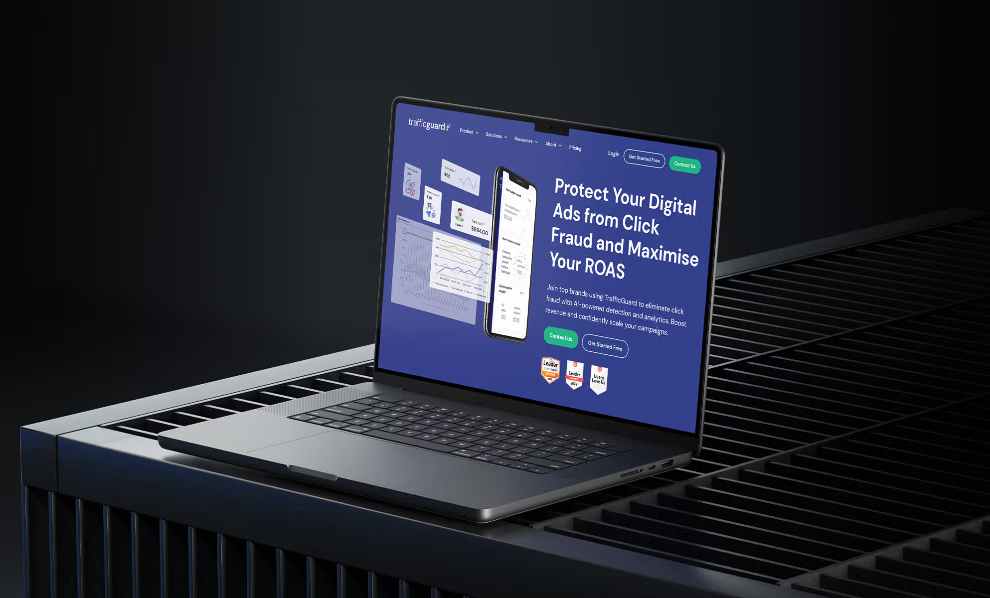 Laptop on metal surface showing digital ad fraud protection website